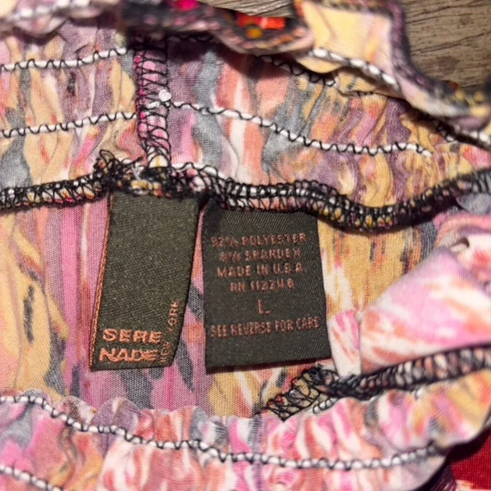 L Sere nade sleeveless multicolored turtlenecked blouse with diamond shapes